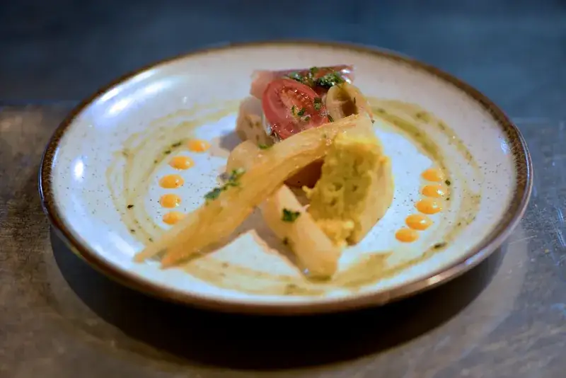 Regional dish on a table; illustrative image, menu to be confirmed